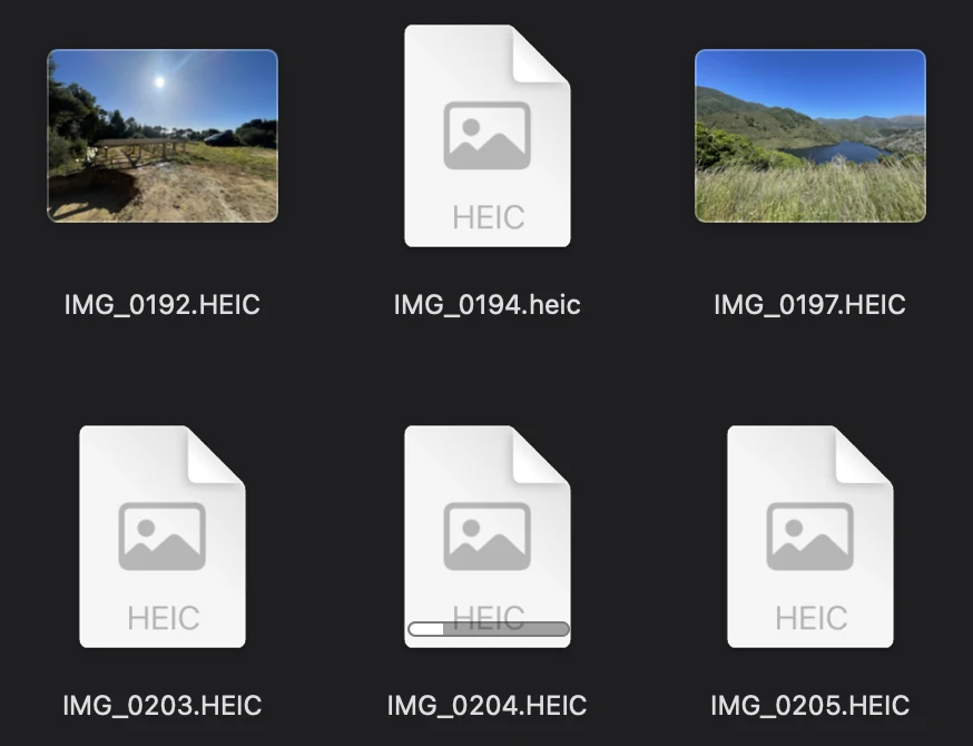 Finder icons on the PhotosFS disk. Photos on the Mac show thumbnails, and IMG_0199.MOV, which is in iCloud, shows a progress bar while it downloads.