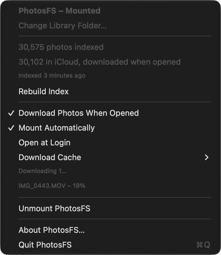 The PhotosFS menu, showing 30,575 photos indexed, the download settings, and one video downloading at 19 percent.